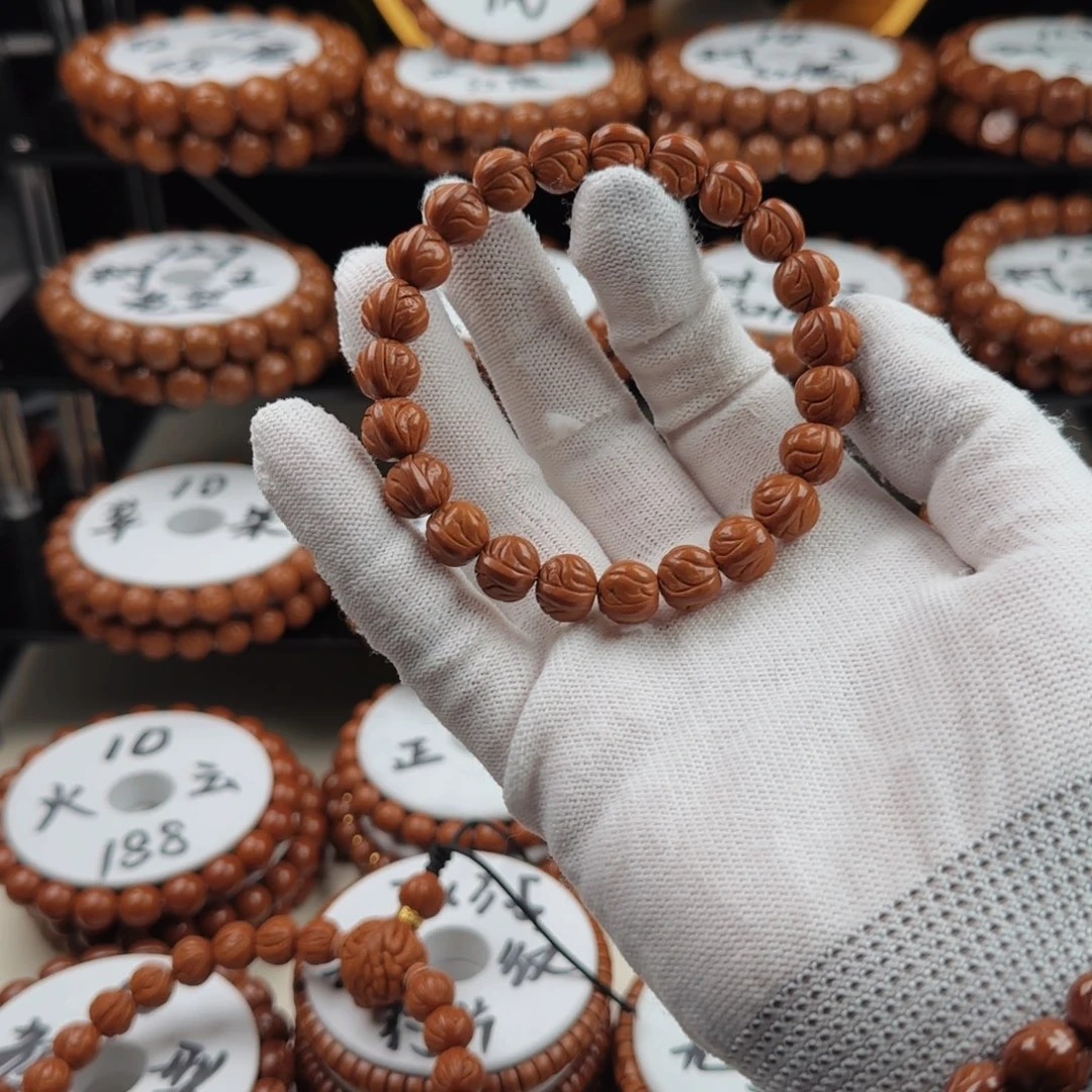 F***Q手串桃核龙纹桃核原皮元宝