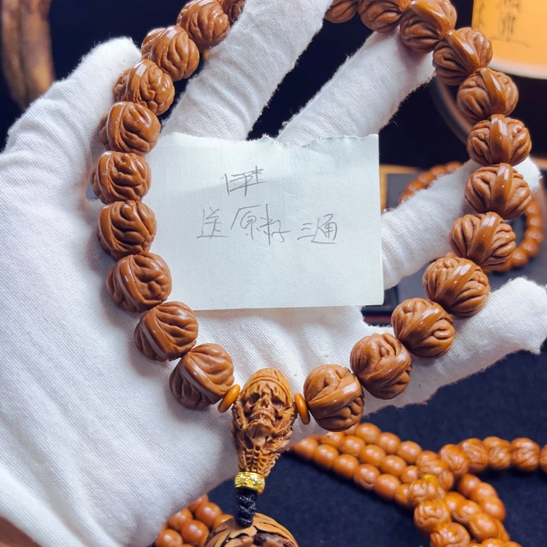 遥***谷桃核吊坠野生桃核