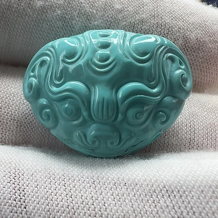 绿松石未镶嵌兽面吊坠