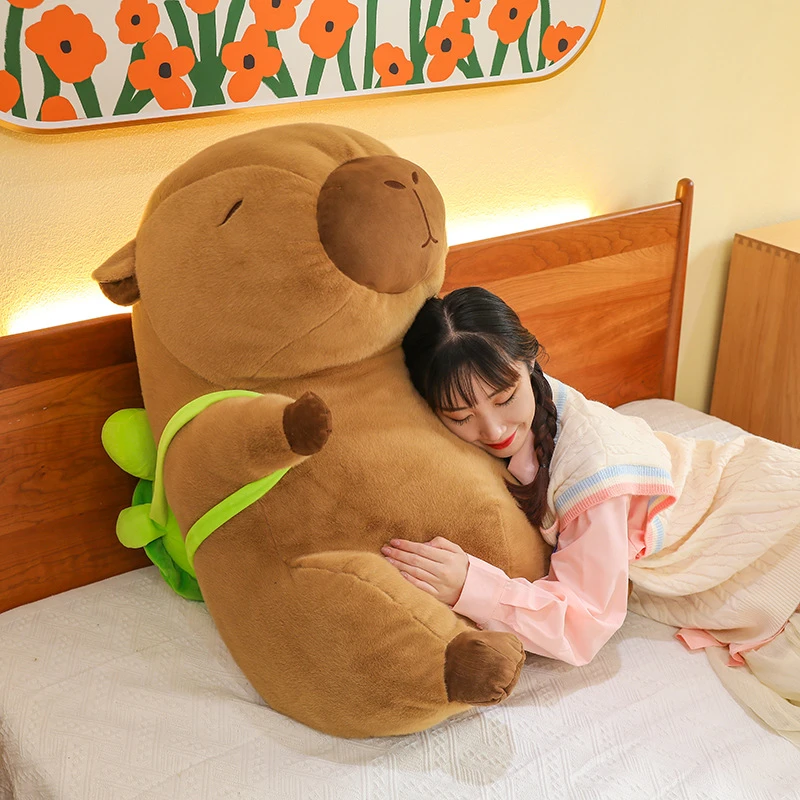 背包卡皮巴拉毛绒玩具水豚公仔丑萌玩偶抱睡抱枕吸卡皮巴拉玩偶