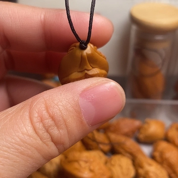 吊坠橄榄核生命，三面