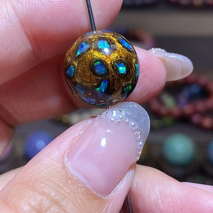 峰***馆大漆珠1.5金色大欧