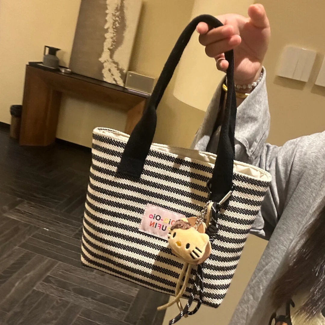韩系慵懒风条纹帆布包包2025新款大容量上课手提袋通勤上班手拎包