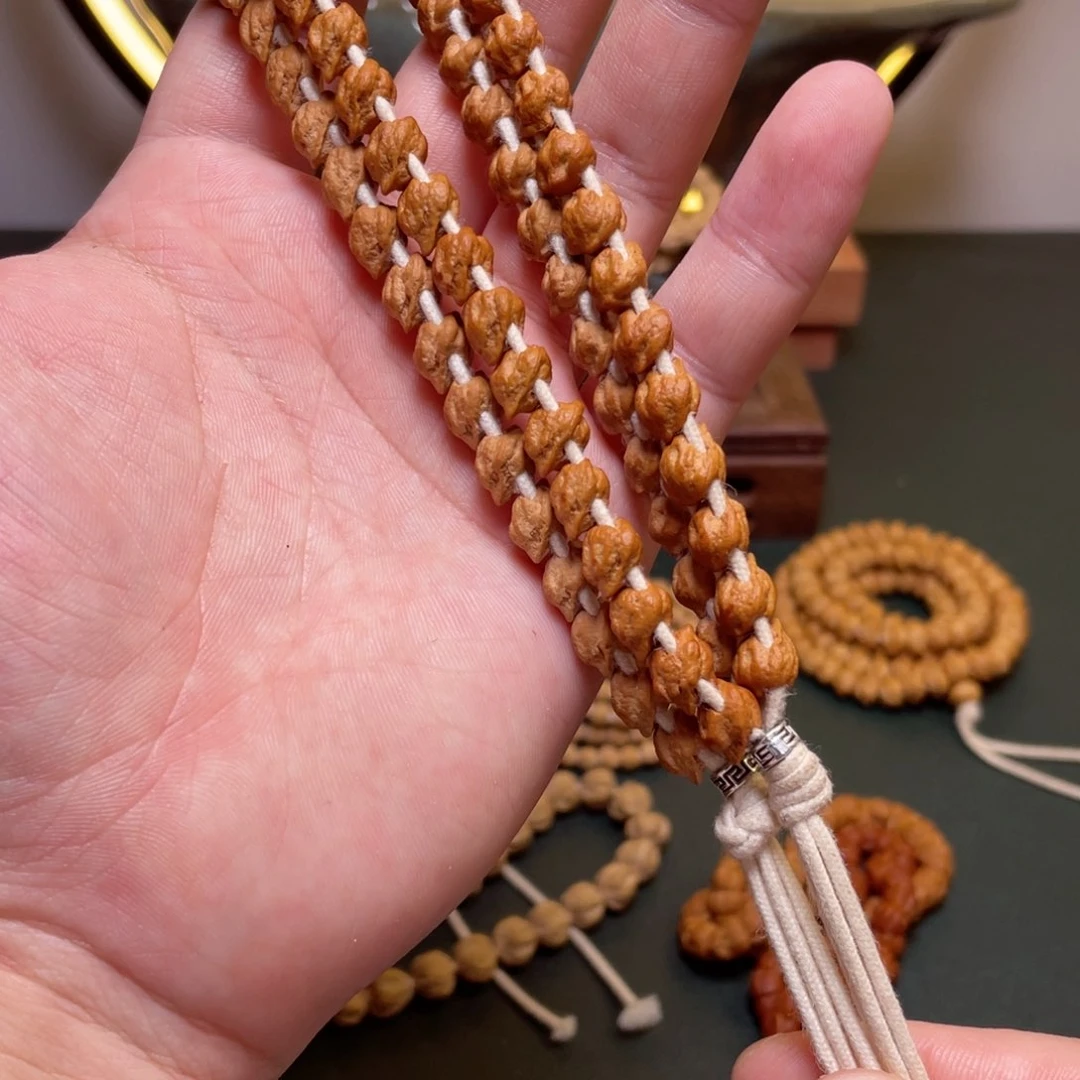 柏香籽/百香籽吊坠蛇骨手持