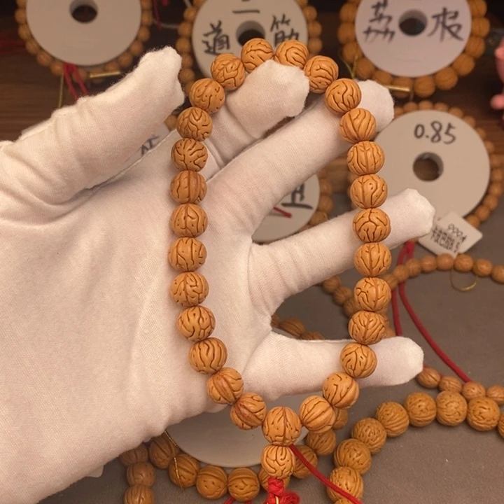 青***里桃核手串奶油大肠12抛光尺寸误差0.5之间