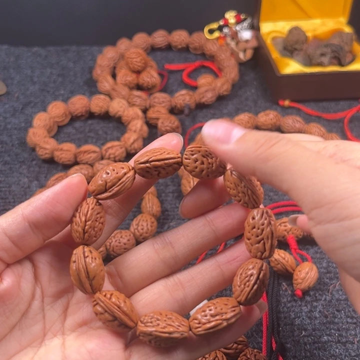 华***玲桃核吊坠桃枭手持L3