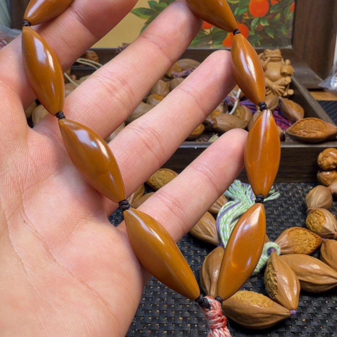 手串/手链橄榄核大长腿