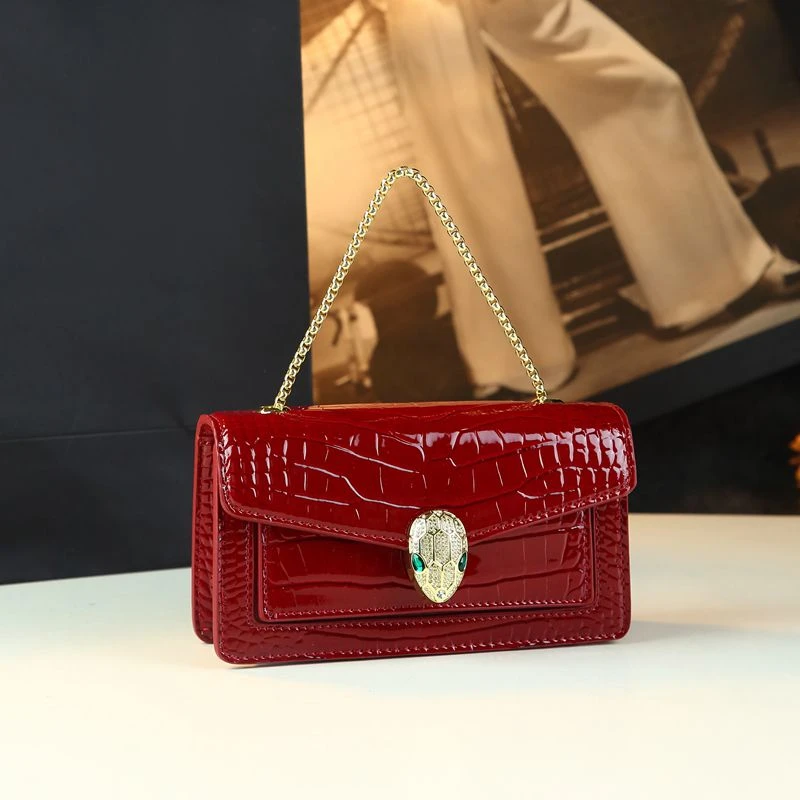2525新款轻奢亮面鳄鱼纹蛇头包风琴包新款婚包手拿单肩斜挎小方包