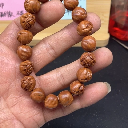 龙纹桃核抓钱手串