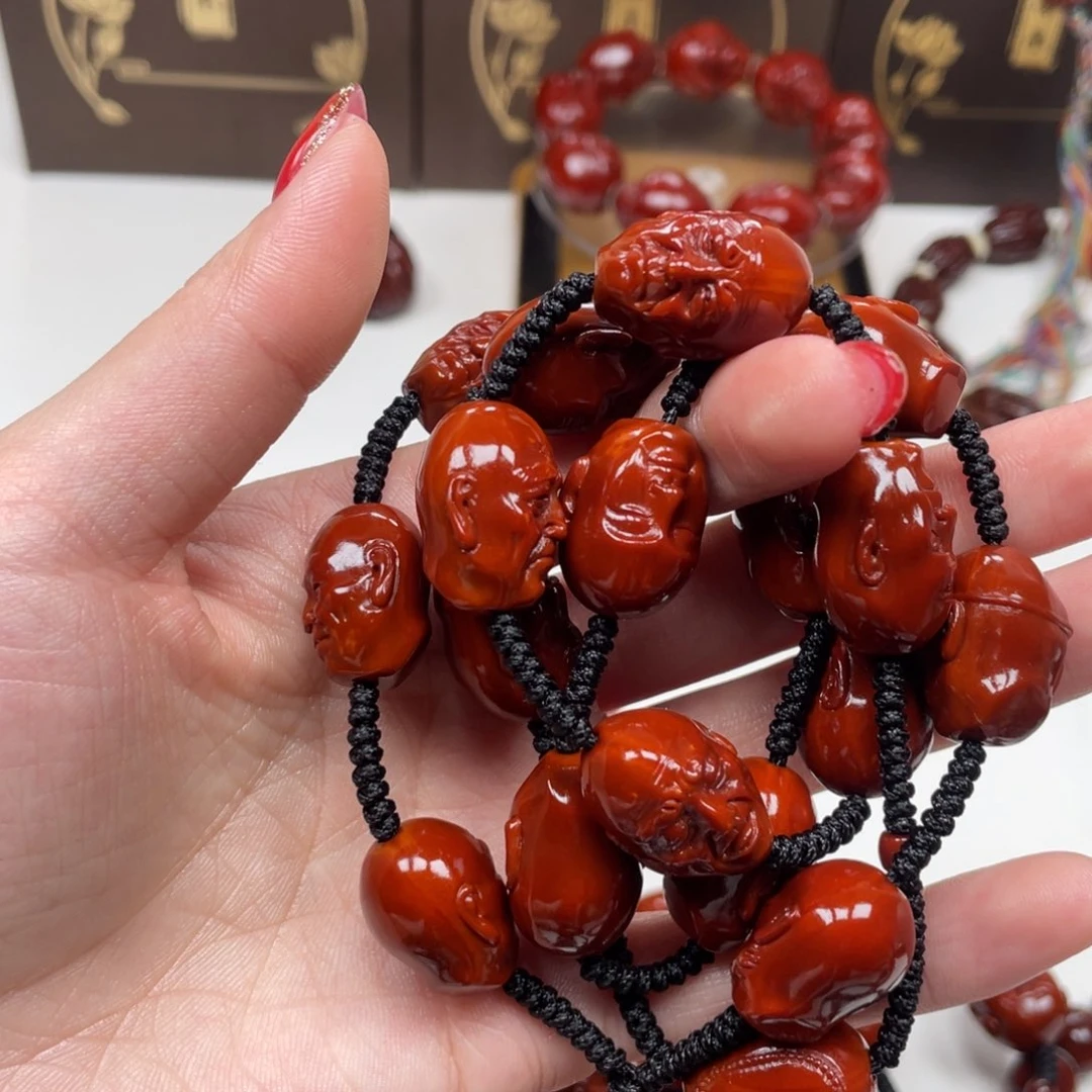 橄榄核手串吊****?十八罗汉脖挂