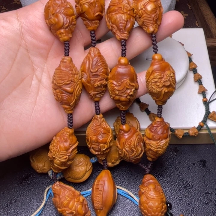 橄榄核手串骑兽罗汉