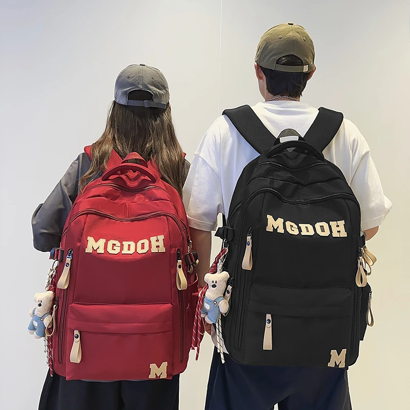 书包大容量减负护脊双肩包男生时尚高中大学生小学生高颜值背包