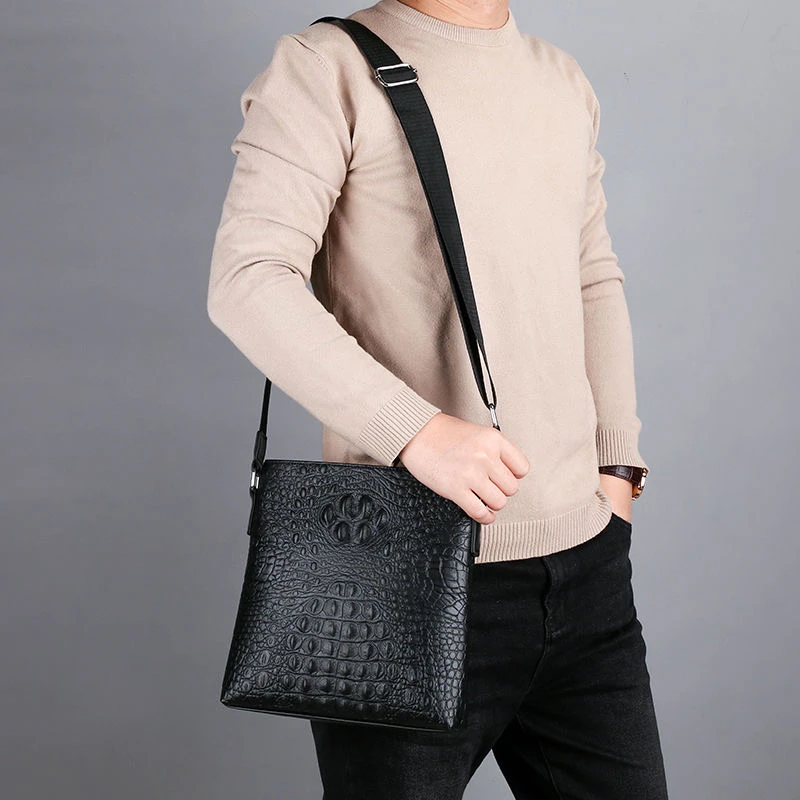 黑色牛皮单肩斜挎包黑色包挎包经典潮流压纹男士休闲可单肩可斜挎