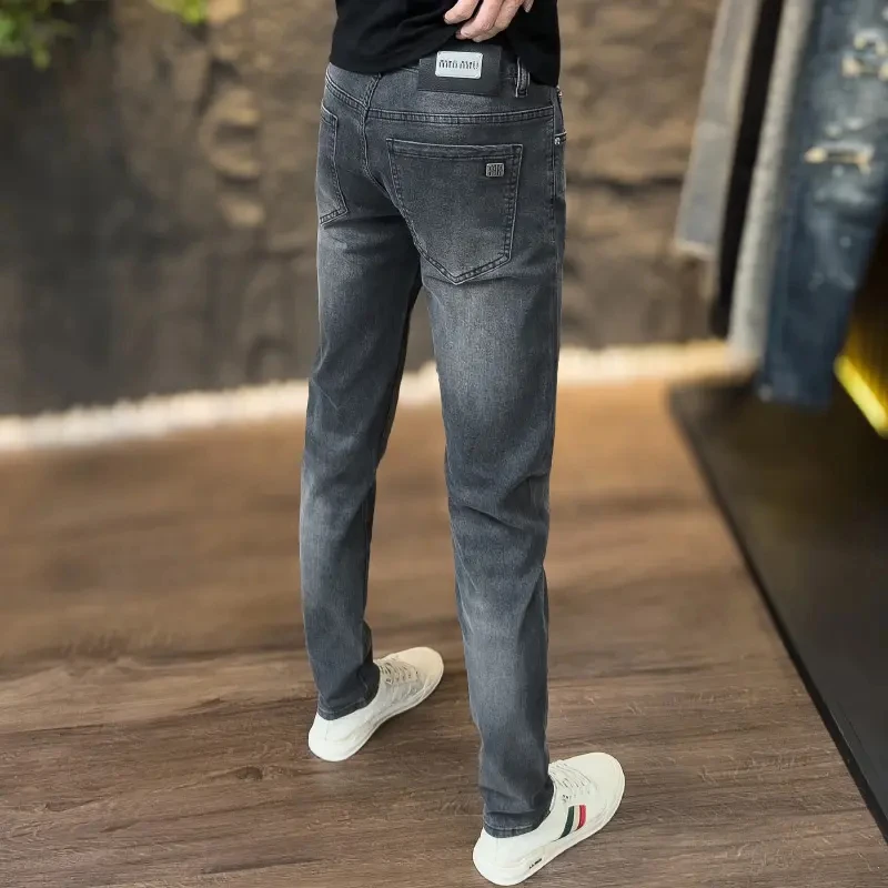 夏季薄款潮流牛仔裤欧货男士时尚商务修身弹力休闲百搭长裤小裤子