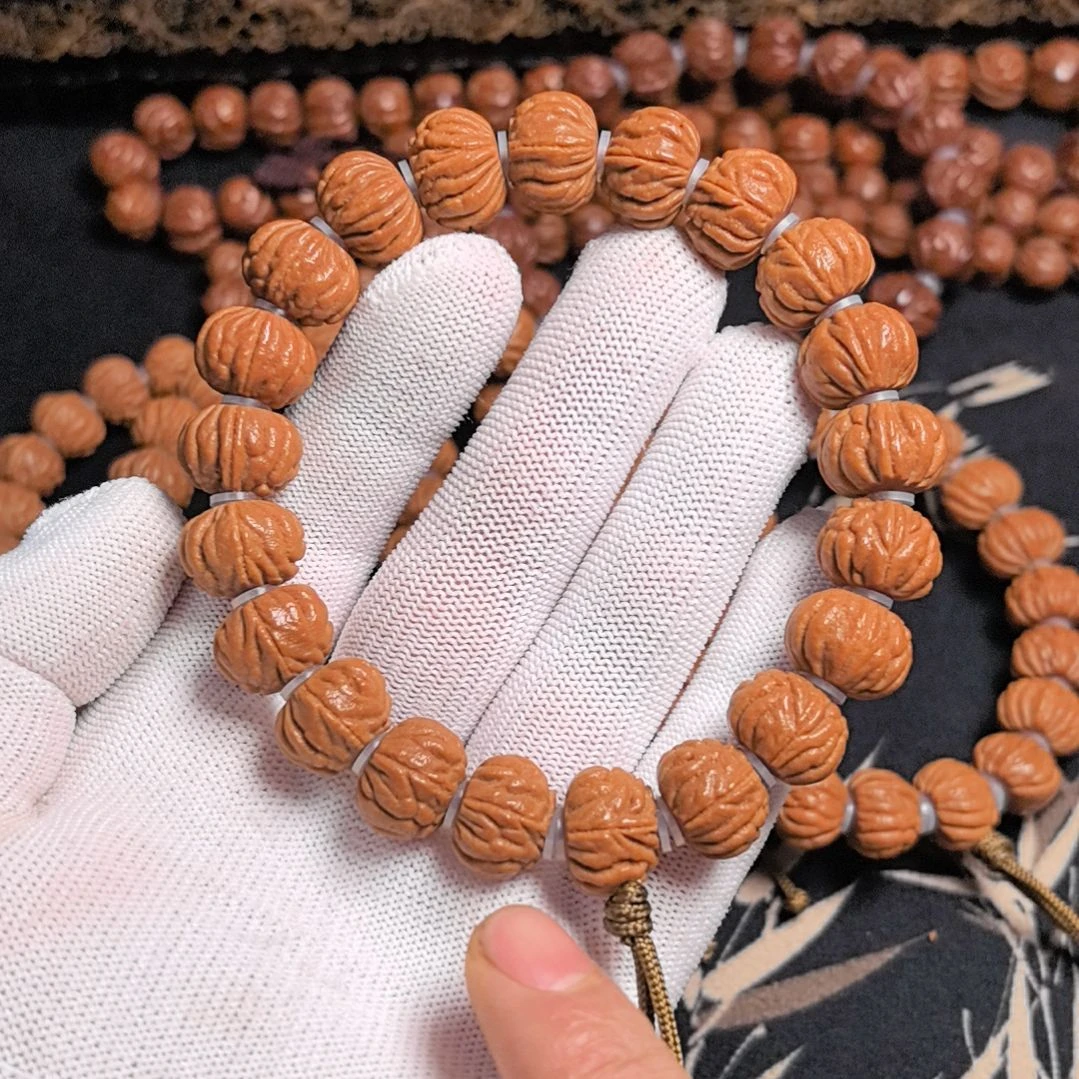 桃核吊坠铁蛋龙手串