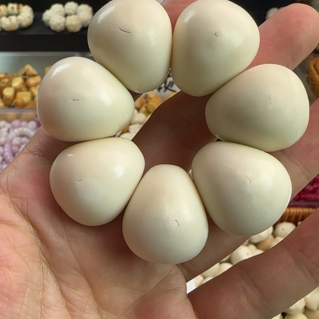 菩提根/象牙果手串瑕疵白色卡24-25白色蒜瓣手捻1个
