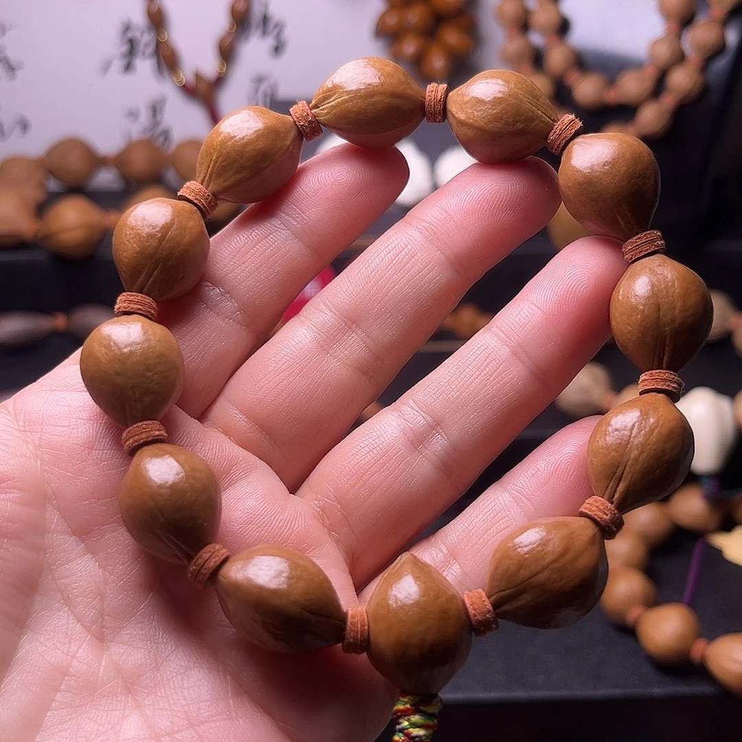 蜜****吊坠橄榄核梅林蜜桃臀15.18