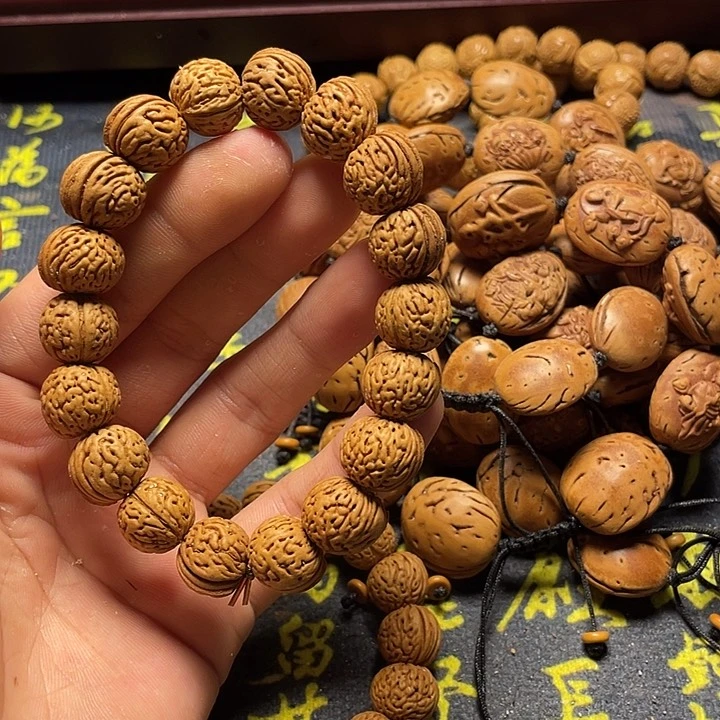 风脑纹桃核素核手串