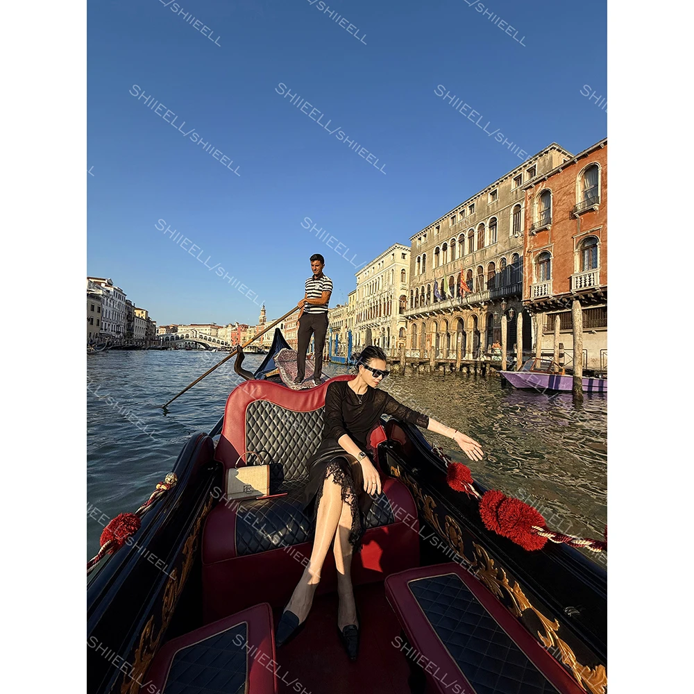 SHIIEELL高智风黑色亮泽羊皮半身裙女冬百搭拼接缝A字半身裙Z5355