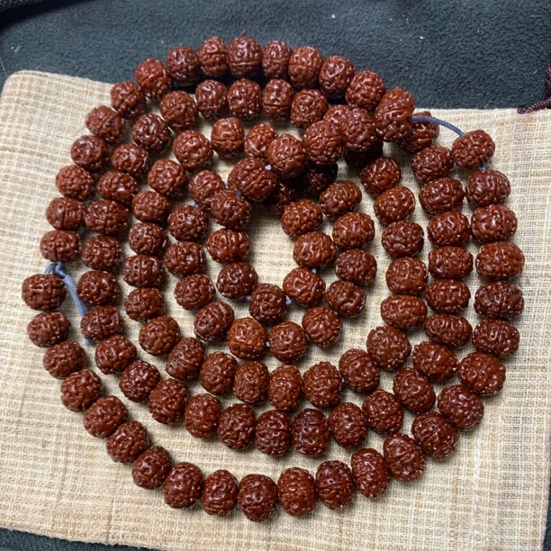 牛筋红约10nm114颗机刷5辨包桨尼泊尔树王金刚菩提飞碟桩手串