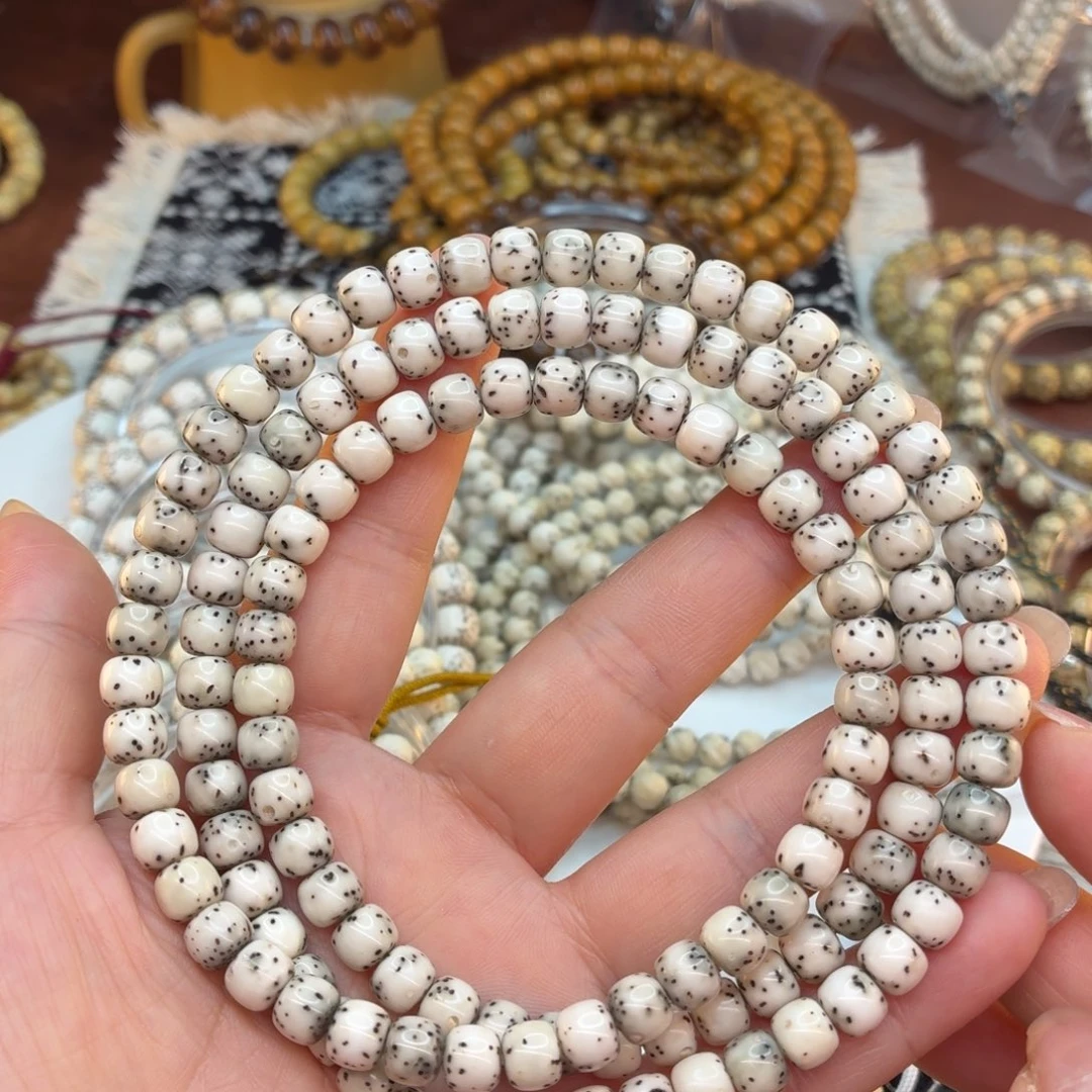 星月菩提吊坠海南星月菩提古瓷白数星星108