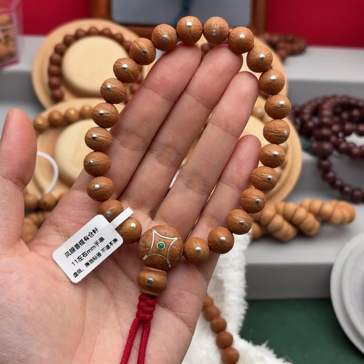 新***州凤眼菩提手串11左右镶嵌手串