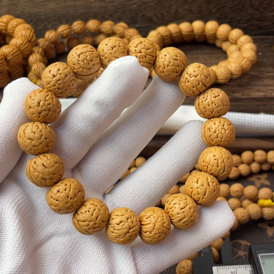 吊坠桃核金丹手串