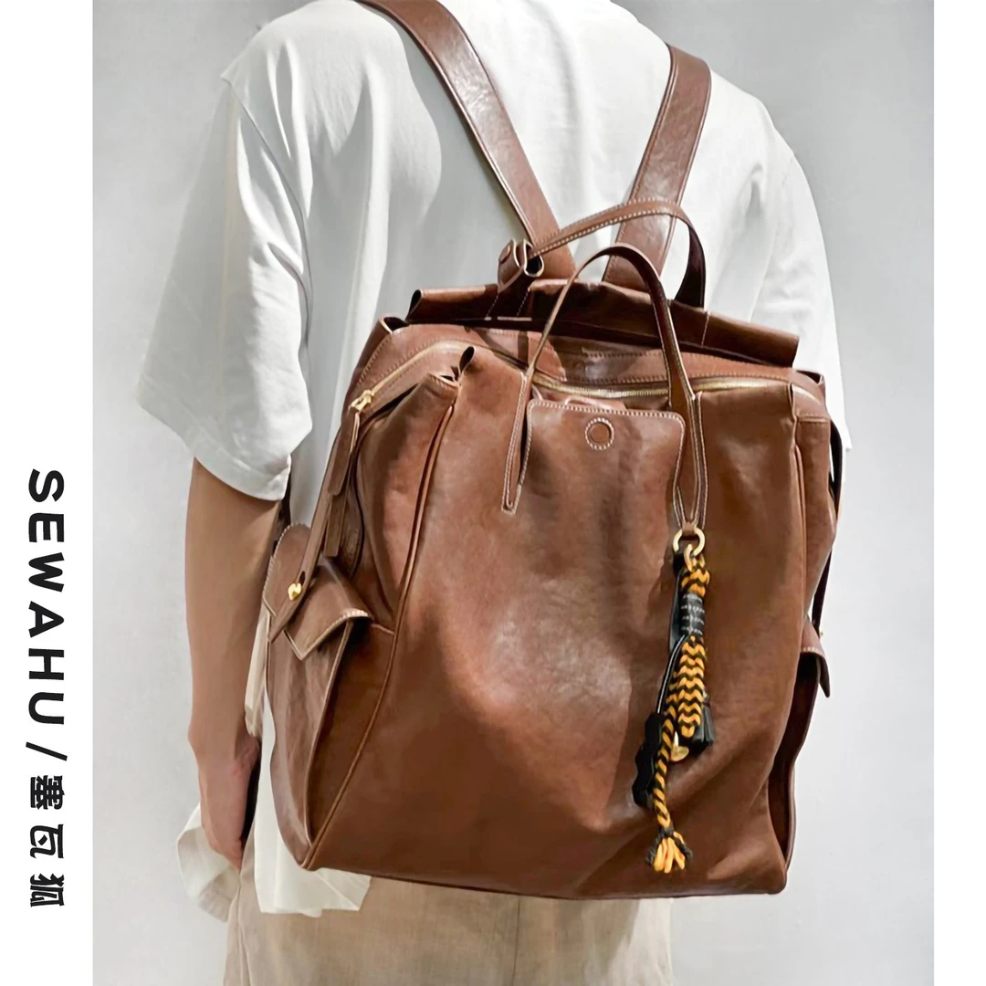 设计感小众双肩包男女皮质通勤包电脑背包2025新款大容量旅行书包