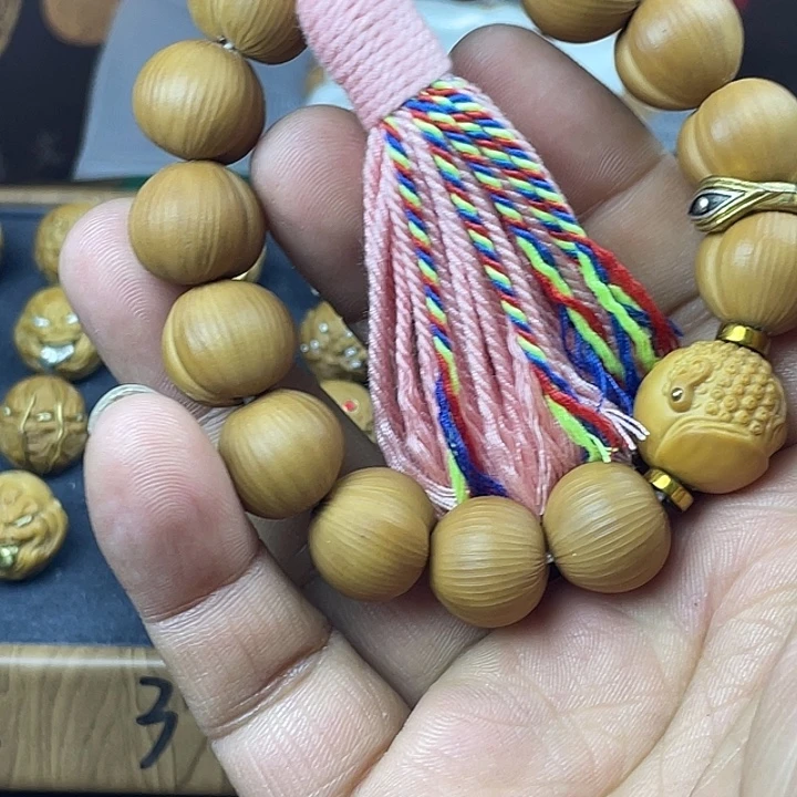 吊坠猴头核桃拉丝皮套