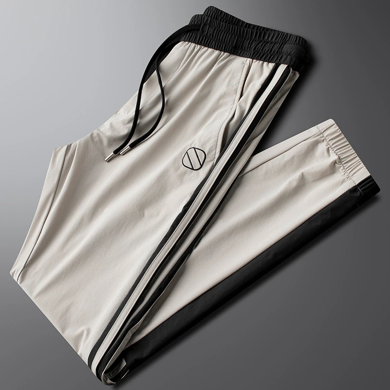 轻奢夏季薄款冰丝速干撞色拼接运动裤男款时尚修身束脚休闲卫裤潮