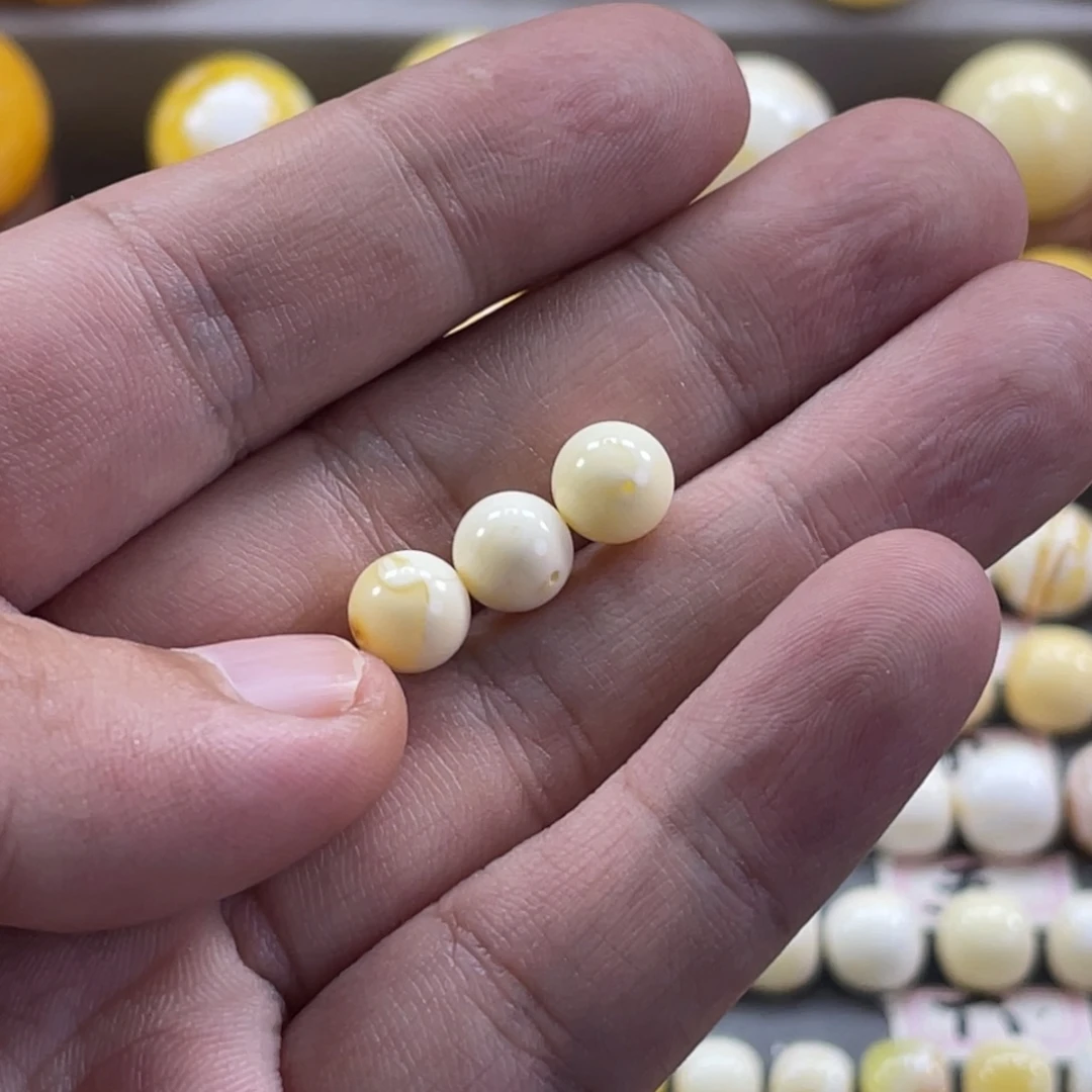 物***本裸石蜜蜡未镶嵌白花圆珠