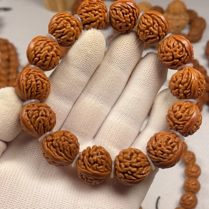 3号链接桃核手串一个