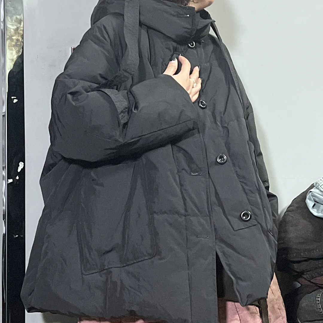黑色连帽大口袋中长款棉衣