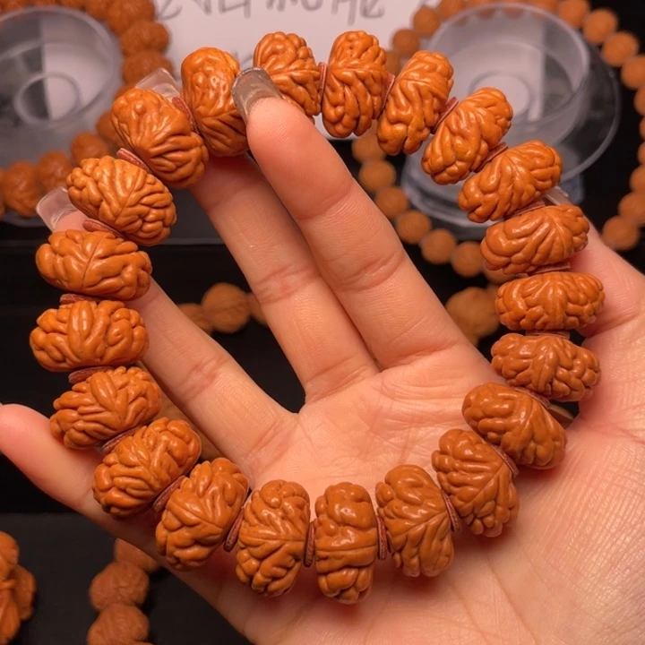 桃核手串21尺寸飞碟豹子头手串（32号链接）