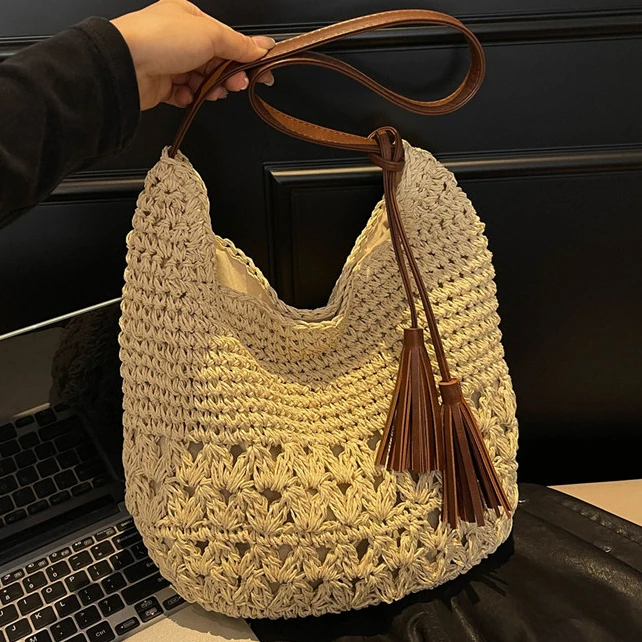 休闲流苏肩包草编包新款小众镂空编织包海边度假风沙滩包时尚女包