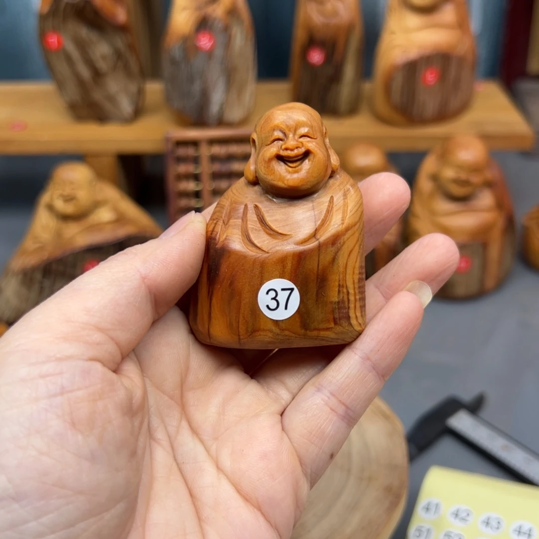 驰***）木崖柏木摆件手把件