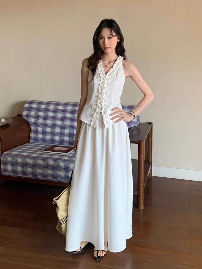 藏青色复古时尚套装女夏季2025新款V领无袖背心百搭半身裙两件套