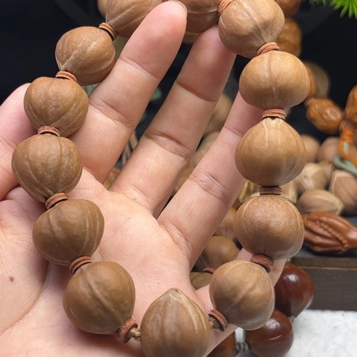 教***n橄榄核手串/手链1.9*2.0三花铁核