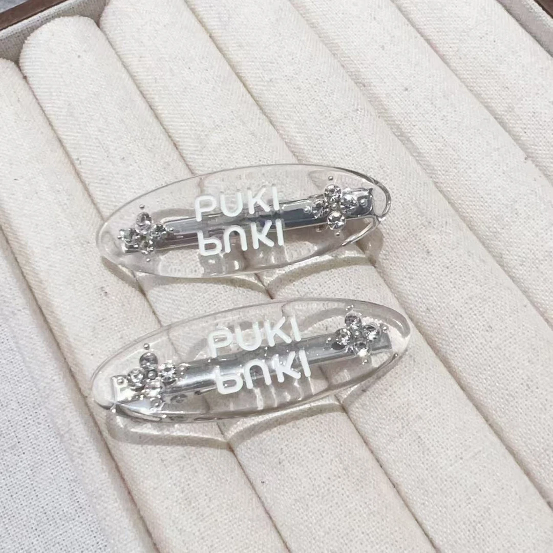 时尚透透字母侧边夹刘海夹J1501