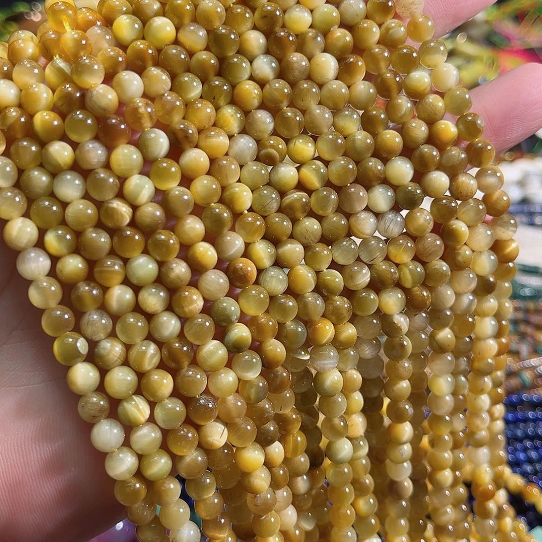 玛瑙/玉髓未镶嵌珠宝半成品A货金虎眼一条6mm