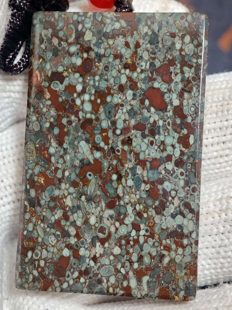 崇山·稀有红彩金属球粒陨石重量约56克规格58*37*8mm