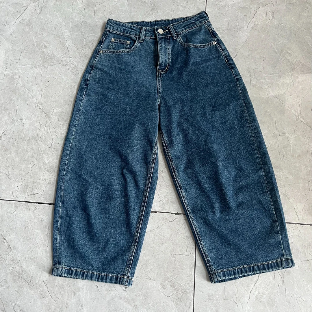 新款休闲百搭显瘦宽松直筒弯刀牛仔裤9090