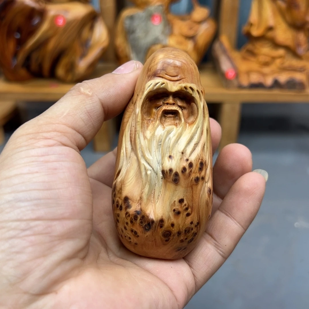 见***齐木崖柏木摆件手把件