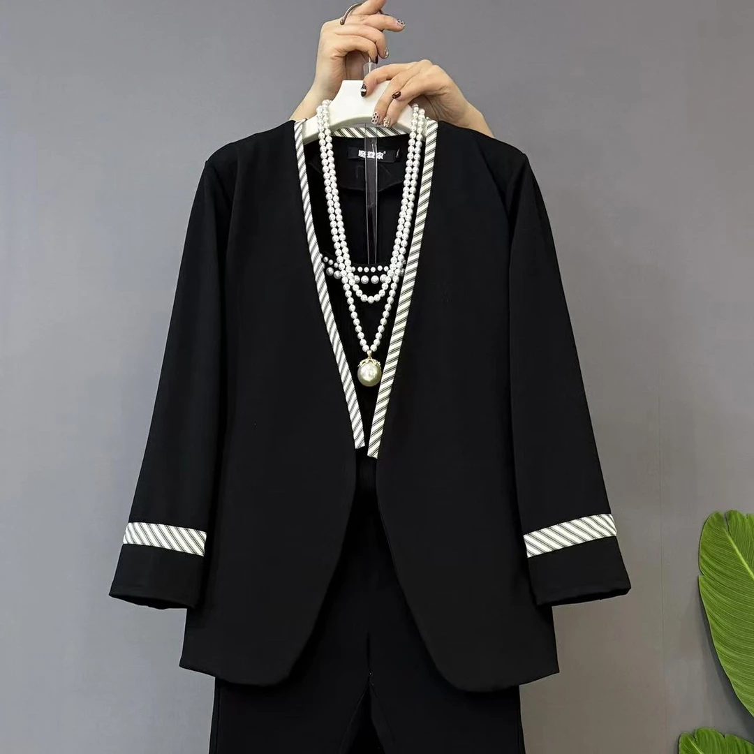 早春新款时尚气质V领镶边西服外套十钻钻裤