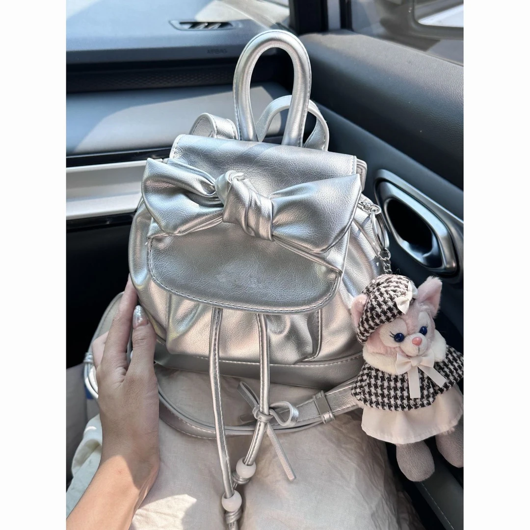 二次元少女银色小众设计手提蝴蝶结水桶双肩包2025新款可爱旅游包