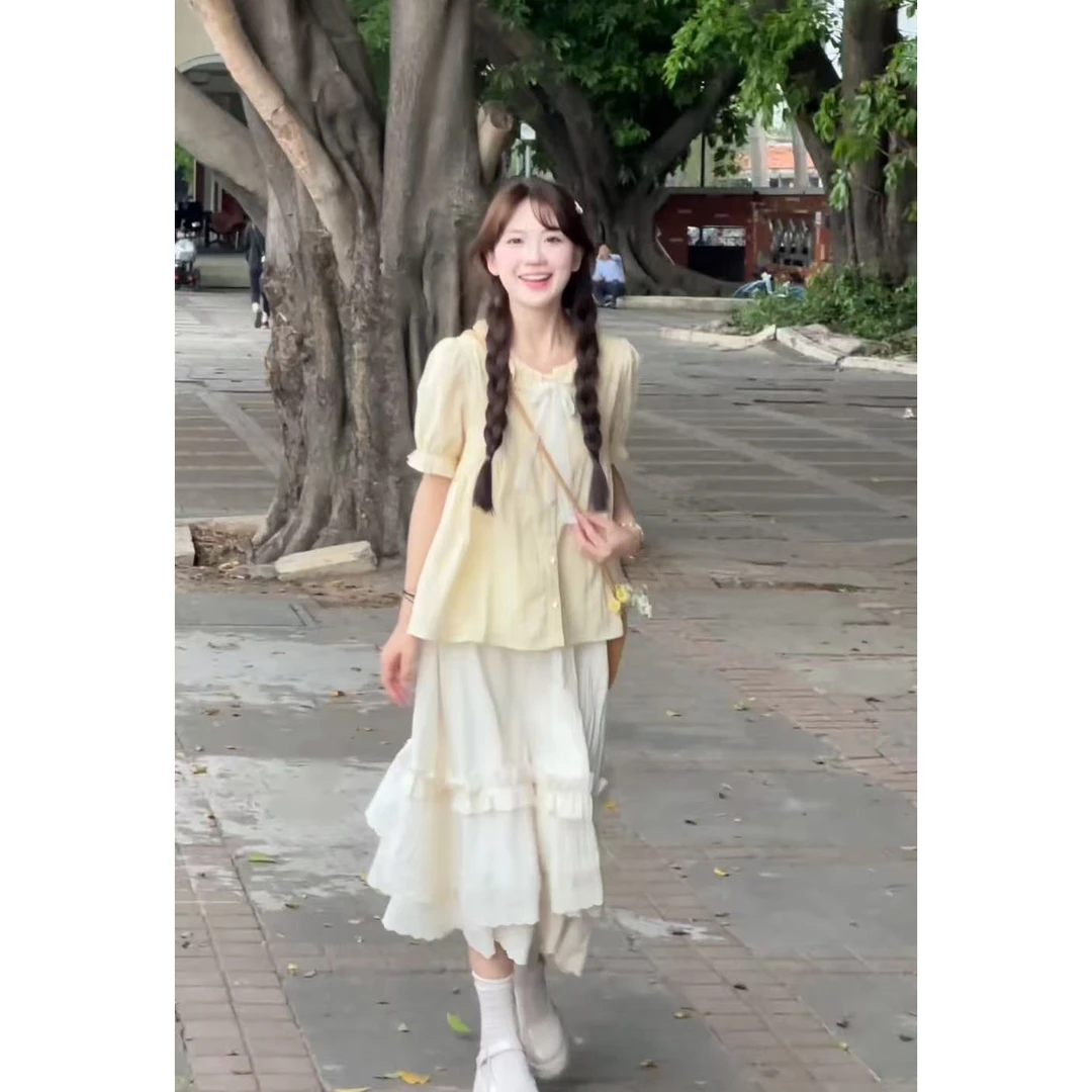 奶黄色衬衫上衣米白色半身裙两件套套装