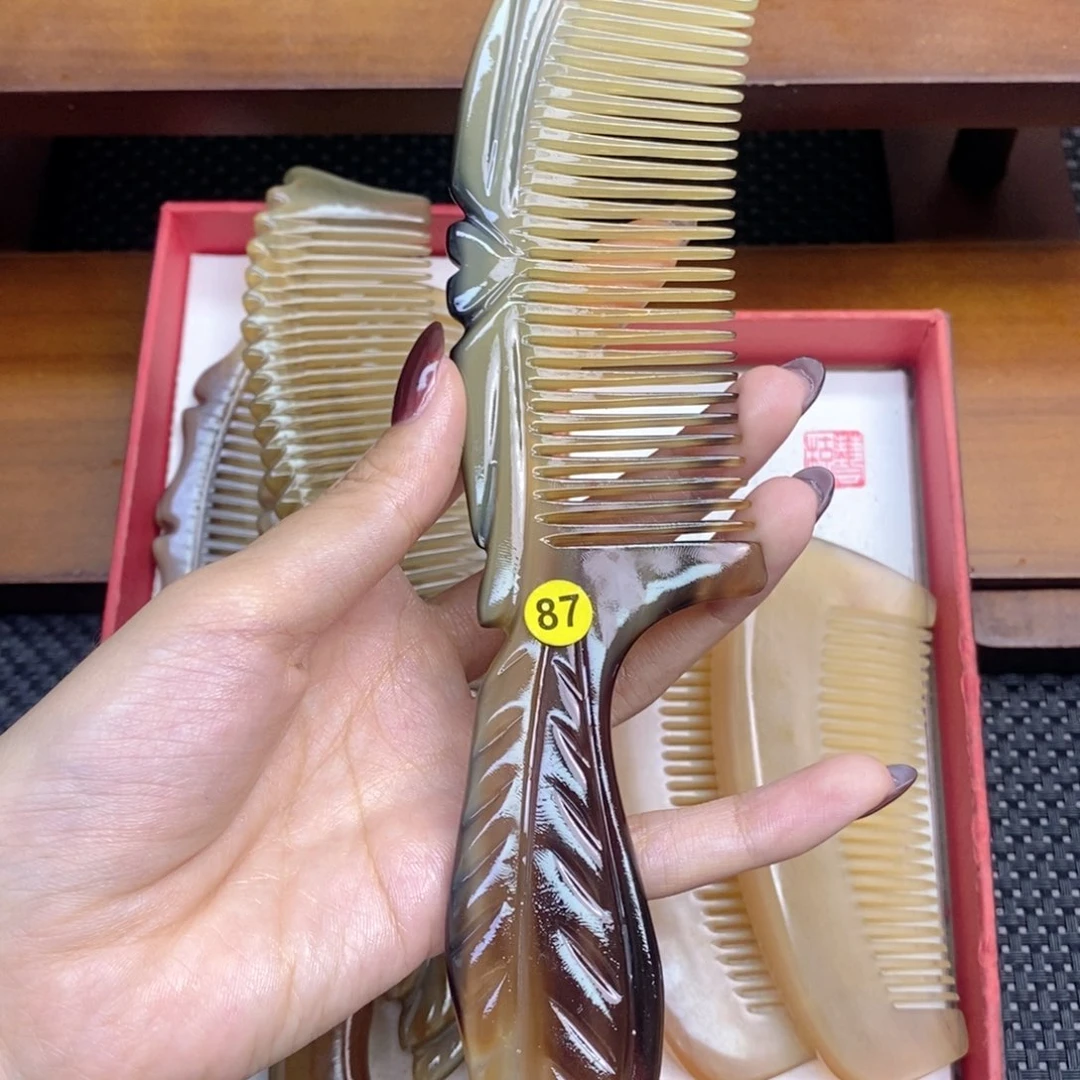 纯手工制作纯牛角梳子凤****）
