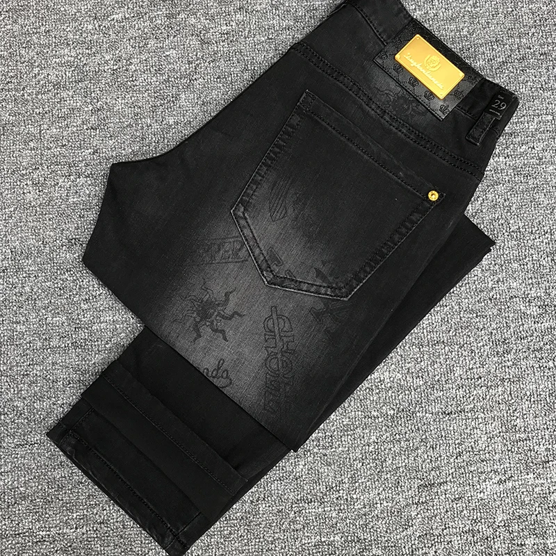 迪诺库克斯潮牌高端印花牛仔裤男黑色弹力休闲时尚修身小脚裤子