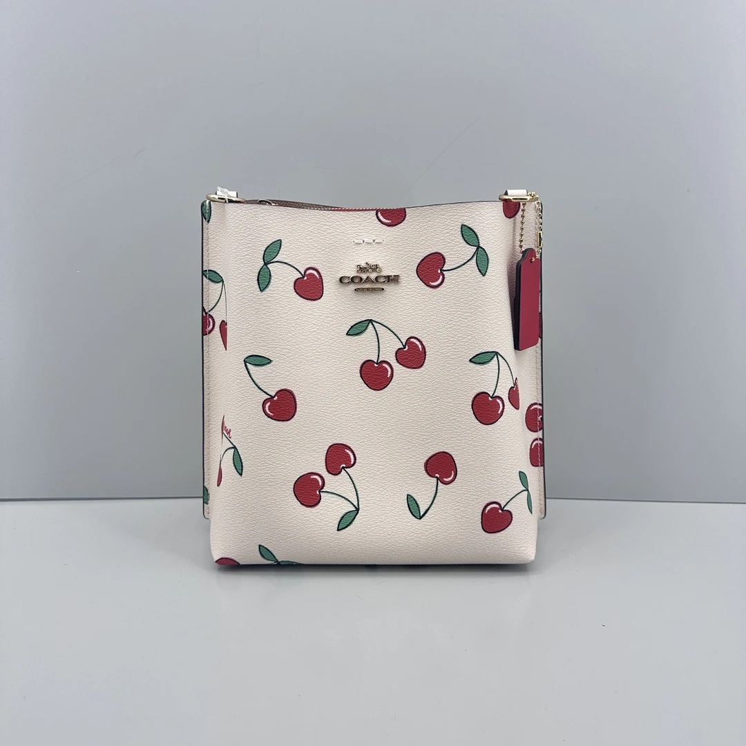99新 COACH/蔻驰 mollie樱桃印花水桶包20x22x10cmL123117