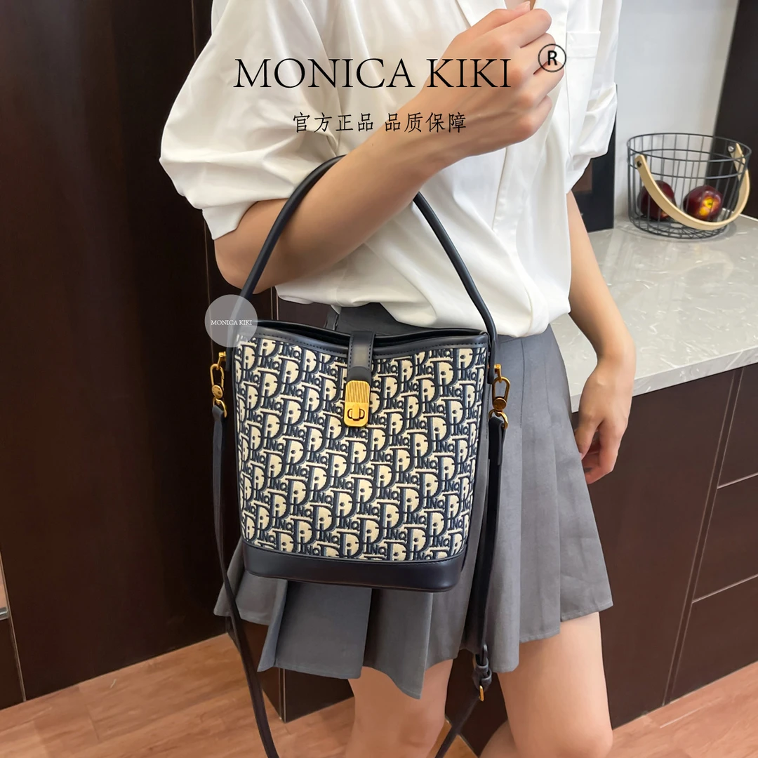 MONICA KIKI/莫妮卡奇奇提花水桶包时尚经典女士轻奢